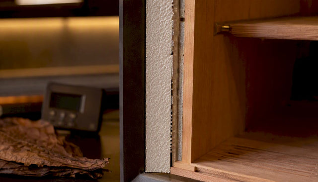 Close-up cross-section of cigar cabinet insulation layers and sensor