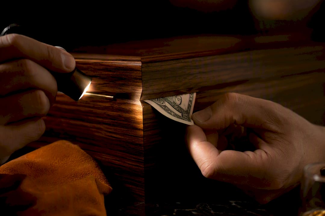 Collector checking a humidor lid seam